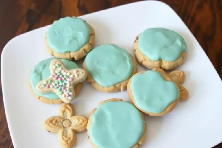 Unique cookie recipes with colorful designs and creative flavors presented on a rustic table.